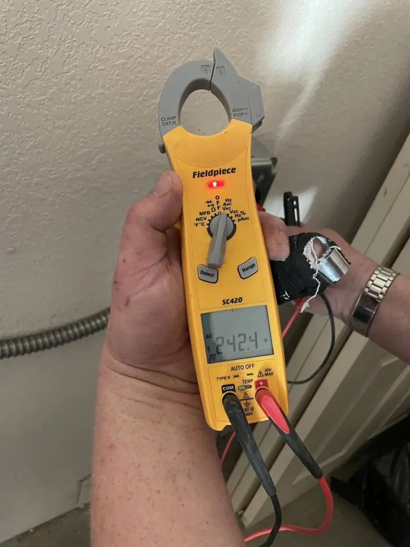 Voltage testing with clamp meter during Generator Installation in Williamstown